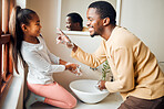 Black family, washing hands and health care with soap to clean in home bathroom. Man teaching girl while cleaning body for safety, healthcare and bacteria for learning about wellness while bonding