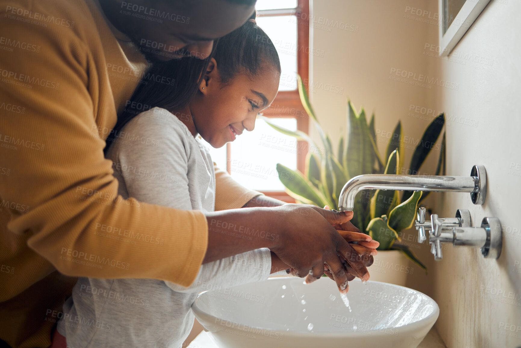 Buy stock photo Black family, father and child washing hands with clean water in home bathroom. Man teaching girl while cleaning body part for safety, healthcare and bacteria for learning about health and wellness