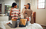 Mom, child and fold laundry in bedroom for hygiene, home cleaning and clean clothes lifestyle in home. Family, mother and daughter helping, happiness conversation and relax working together on bed