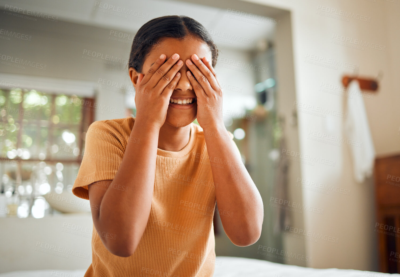 Buy stock photo Cover eyes, grooming and child in the bathroom for facial cleaning, wellness and hygiene. Health, happy and girl hiding her face for beauty, washing and clean in a house with a smile in the morning