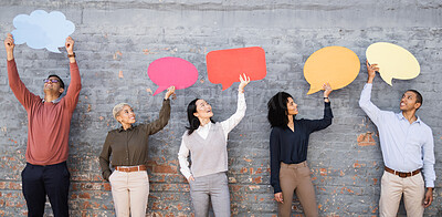 Buy stock photo Speech bubble, communication and news with business people and mockup for social media, vote and review. Design, contact and chat sign with employee and board at brick wall for voice and opinion 