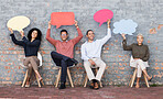 Speech bubble, feedback and idea with business people and mockup for social media, vote and review. Design, contact and chat sign with employee and board at brick wall for voice, opinion and news