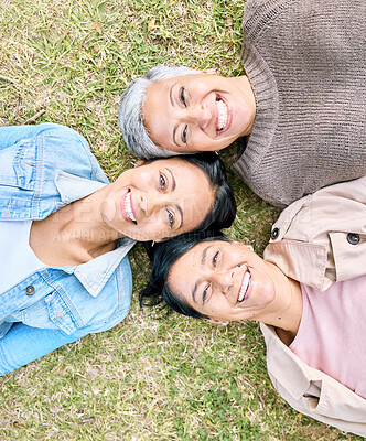 Buy stock photo Portrait, family and mother, grandmother and adult daughter relax on grass, happy and bonding in a garden. Face, generations and women having fun, laughing and enjoying the weekend at a park together