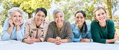 Buy stock photo Friends, portrait and senior women on picnic at park for bonding, wellness and relaxing on blanket. Happiness, relax or group of elderly retirement people in interracial friendship in nature together