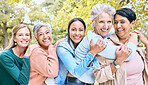 Friends, park and group of women hug enjoying bonding, quality time and relax in nature together. Diversity, friendship and portrait of happy senior females with smile, embrace and peace outdoors