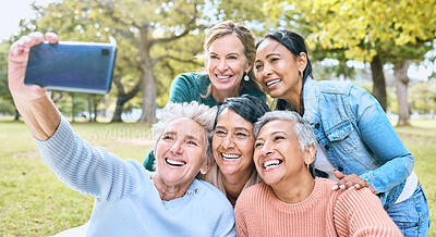 Buy stock photo Senior woman, friends and phone for selfie at the park together with smile and peace sign in the outdoors. Happy group of silly elderly women smiling for photo looking at smartphone in nature