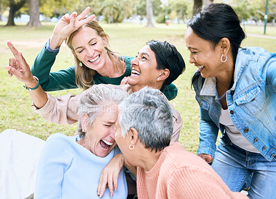 Buy stock photo Retirement, women and laughing in funny games, comic bonding and silly global activity with peace sign hands. Smile, happy and elderly senior friends in nature park, grass garden or community support