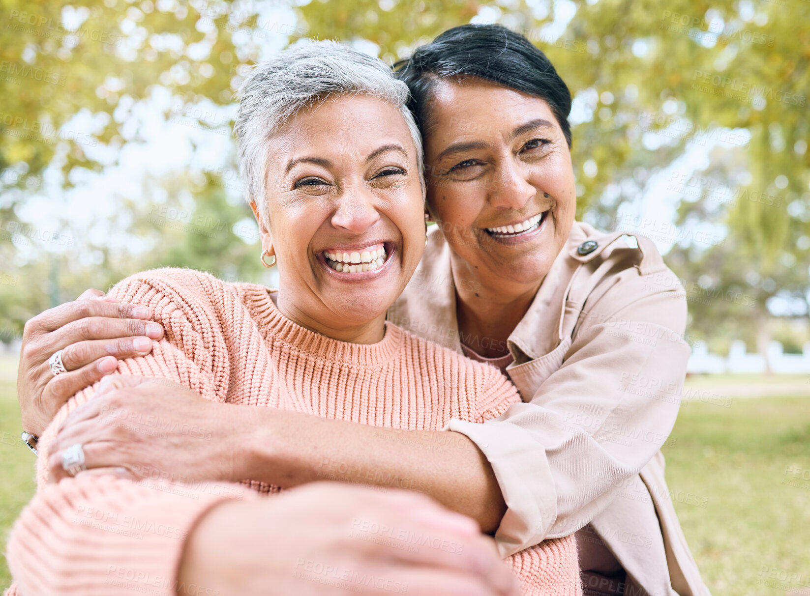 Buy stock photo Couple of friends, seniors and portrait hug in nature park, grass garden and relax environment for profile picture. Smile, happy women and bonding retirement elderly in love embrace for social media