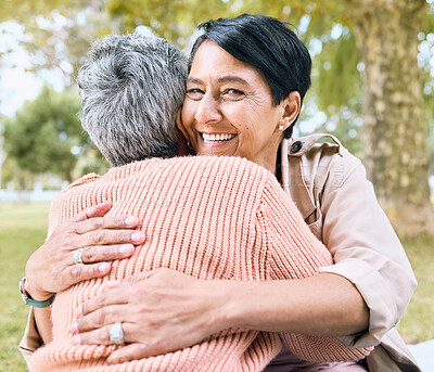 Buy stock photo Couple of friends, retirement and portrait hug in nature park, grass garden and relax environment for support and love. Smile, happy women and bonding elderly senior in birthday celebration embrace