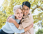 Senior women, portrait and laughing hug in nature park, garden or relax environment in retirement, support or trust. Smile, happy friends and bonding elderly in embrace, comic activity or funny joke