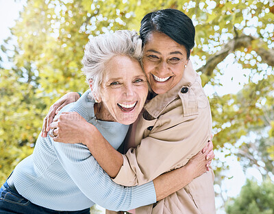 Buy stock photo Senior women, portrait and laughing hug in nature park, garden or relax environment in retirement, support or trust. Smile, happy friends and bonding elderly in embrace, comic activity or funny joke