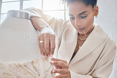 Buy stock photo Fashion designer, planning and mannequin with black woman in workshop for factory, manufacturing and retail. Creative, idea and fabric with girl and couture dress in studio for small business