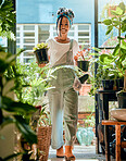 Black woman, portrait and plant shop for gardening, nursery or greenhouse retail. Entrepreneur working in green startup or small business for sustainability, environment and entrepreneur growth