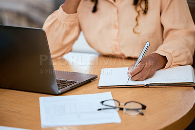 Buy stock photo Hand, writing and pen with a freelance black woman doing remote work using a laptop in her home. Norebook, documents and computer with a female freelancer doing business in her house or office