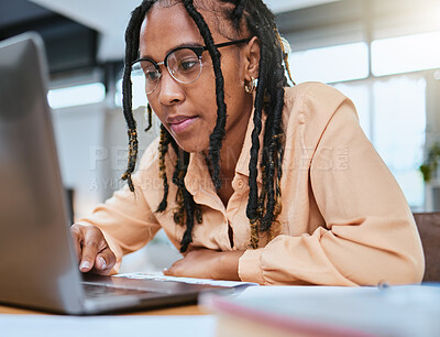 Buy stock photo Black woman, laptop and focus reading communication for email conversation, web management or planning strategy. African girl, typing and online networking or check digital marketing on tech device