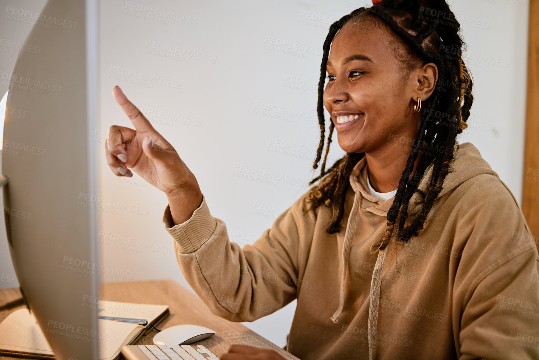 Buy stock photo Computer, education and research with a student black woman pointing at her screen while learning at home. Study, internet and point with a happy female pupil studying for university or college