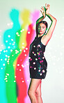 Woman, fashion and dancing neon shadow or lights for a kaleidoscope party on a studio background. Beauty, art and aesthetic model confident about creative style for color magazine mockup or copyspace