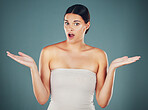 Woman, shocked face portrait and hands for surprise, announcement or excited isolated in studio background. Young female, scared facial expression and shock mouth with wow amazed hands gesture 