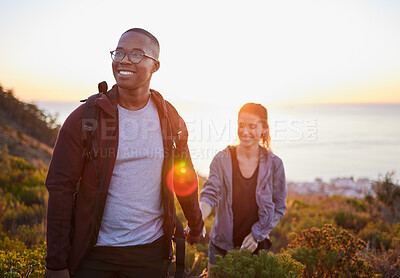 Buy stock photo Interracial couple, workout and hiking exercise in sunset on a mountain as morning fitness in nature. Happy people, man and woman in a relationship training for health and wellness together