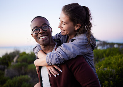 Buy stock photo Love, nature and interracial couple piggyback on mountain adventure for holiday, vacation and hiking on weekend. Travel, dating and happy man carry woman enjoying calm, outdoor freedom and peace