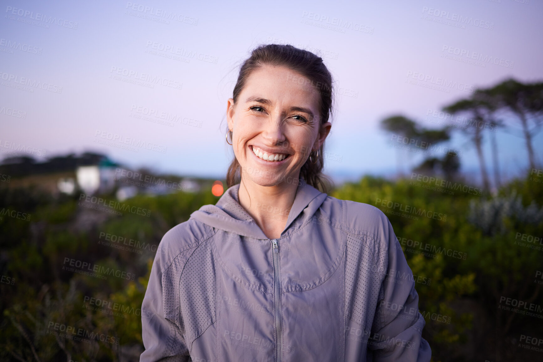 Buy stock photo Happy, sunset and portrait of a woman in a park during dusk for peace, calm and zen. Adventure, hike and face of a girl on a walk for fitness, summer cardio and relaxing during dawn in nature