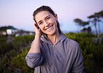 Happy, beautiful and portrait of a woman in nature during sunset for peace, calm and zen. Adventure, hike and smile of a girl on a walk for fitness, cardio and relaxing during dawn in a park