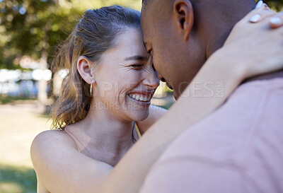 Buy stock photo Happy, hug and interracial couple love, laugh and fun at park date in diversity, summer celebration or romance. Black man, partner or people smile together in garden excited for anniversary in nature