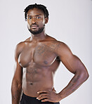 Black man, fitness and portrait of sports person in studio for strong body, muscle and power. Health and wellness of a sexy male bodybuilder model with growth after exercise, workout and training