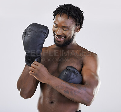 Buy stock photo Boxing, fitness and black man happy about fight for sport training and workout in studio. Athlete boxer gloves for exercise, performance and mma competition with power and energy for motivation