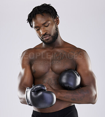 Buy stock photo Fitness, boxing gloves and black man fight for sports training and workout in studio with strong muscle. Athlete boxer person ready for exercise, performance and mma competition with power and energy