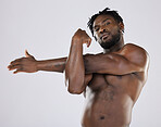 Black man, fitness and stretching portrait with sports person in studio for strong body and muscle. Health and wellness of a sexy male bodybuilder model with goals for exercise, workout and training