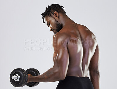 Buy stock photo Fitness, exercise and strong black man training with weights for bicep muscle workout in studio. Body of a sports person or bodybuilder with dumbbell to train for power, health and wellness or growth
