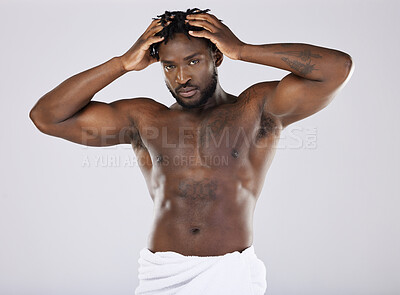 Buy stock photo Muscular, portrait and black man with cosmetics, skincare and confident guy on grey studio background. African American male, body builder or person with muscles, torso or dermatology for smooth skin