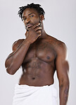 Nude, black man in towel with muscle in portrait and shower, hygiene and beauty isolated on studio background. Abs, fitness and facial with skin, skincare glow and body care with natural cosmetics