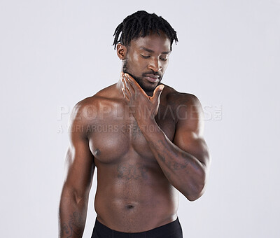 Buy stock photo Black man, skincare and fitness portrait with body sports person in studio for strong muscle and power. Health and wellness of a sexy male bodybuilder with growth after exercise, workout and training