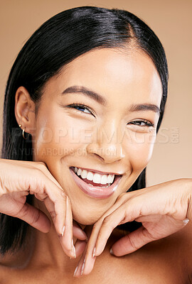 Buy stock photo Beauty, makeup and portrait of a woman with foundation for skincare isolated on a studio background. Laughing, happiness and face of a cosmetics latino model smiling for glow on skin on a backdrop