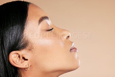 Buy stock photo Makeup, beauty and face of a woman with mockup for skincare isolated on a studio background. Spa, dermatology and side profile facial cosmetics of a woman with cosmetology on a backdrop with space