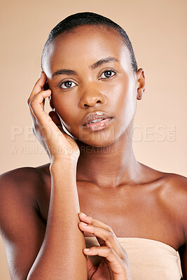Buy stock photo Black woman, portrait and makeup in skincare cosmetics for soft beauty isolated against studio background. African American female model, person or lady touching face for glow, smooth or perfect skin