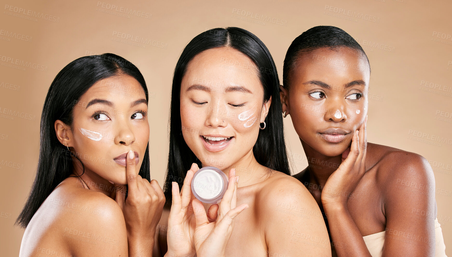 Buy stock photo Skincare, women and face cream in studio for wellness, grooming and hygiene against brown background. Friends, beauty and lotion for girl group with different, facial and skin product while isolated