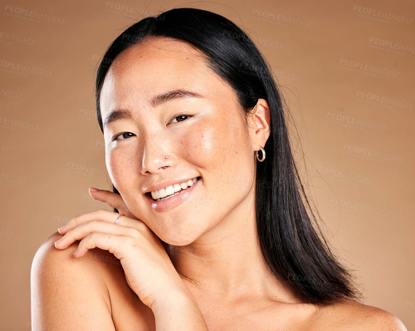 Buy stock photo Portrait, beauty and treatment with a model asian woman in studio on a beige background for natural skincare. Wellness, aesthetic or facial with an attractive young female posing to promote antiaging