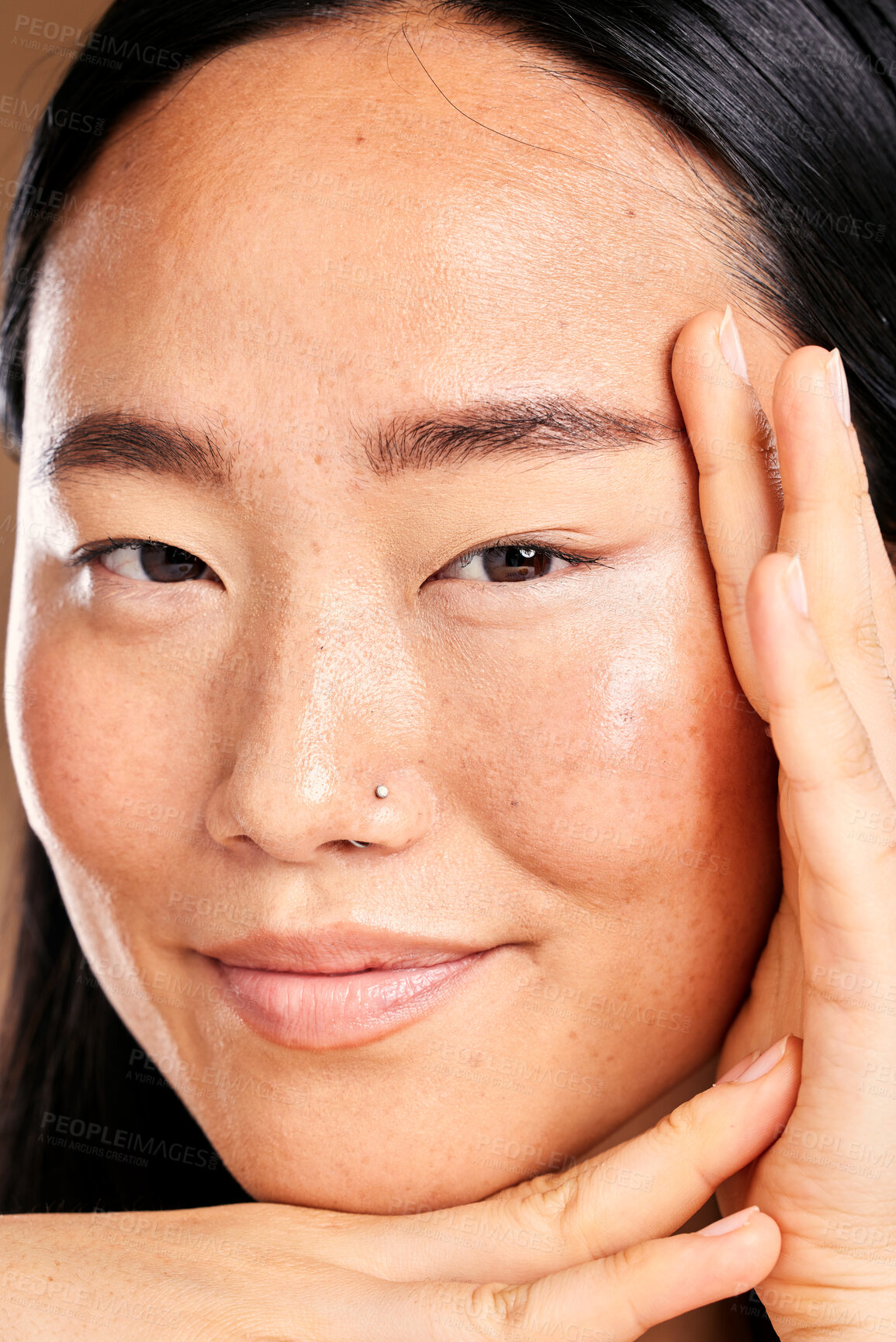 Buy stock photo Closeup portrait, hand frame and asian woman in studio with skincare, natural skin glow and smile. Happy japanese model, cosmetic beauty and healthy aesthetic with self care, wellness and headshot