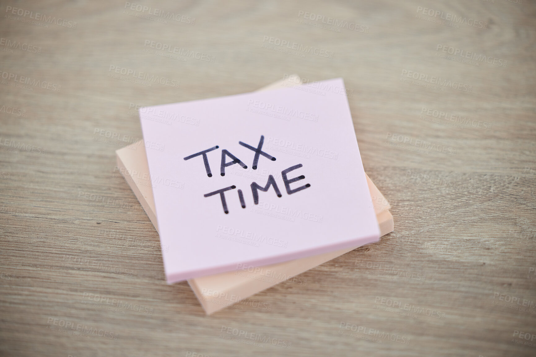 Buy stock photo Tax, planning and sticky note with reminder for finance, audit and wealth on a desk. Accounting, payment and paper with a message for taxation deadline, returns and strategy with money on a table