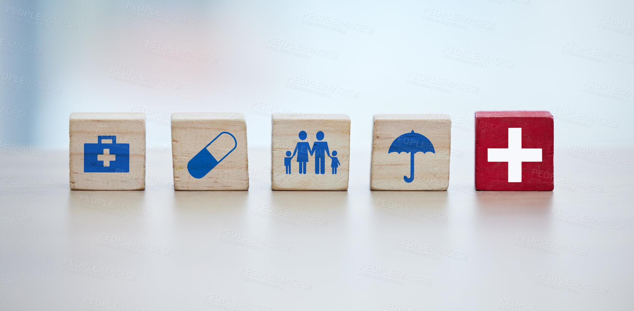 Buy stock photo Healthcare, insurance and wooden blocks in studio on an empty gray background for safety or security. Abstract, medicine and health with block toys in a hospital or clinic for medical care