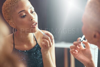 Buy stock photo Makeup, fancy and mirror reflection of a woman getting ready for a party, disco or event in a bathroom. Beauty, grooming and face of an elegant girl applying lipstick for a classy new year social