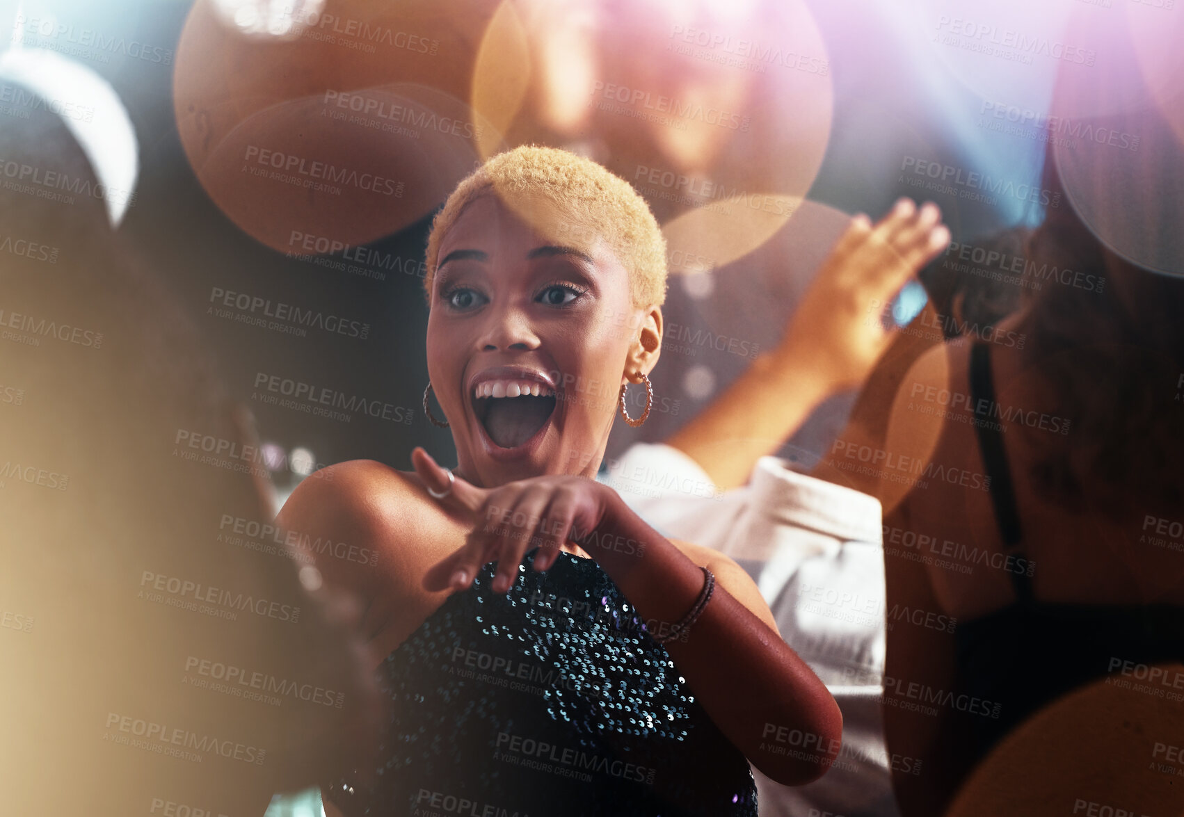 Buy stock photo Dance, night and disco with black woman at party for club, celebration and energy. Concert, music and rave with girl dancing in crowd for new year, freedom and entertainment at dj festival event