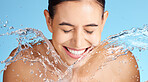 Water, beauty and skincare, woman with smile, mockup and product placement on clean blue background. Dermatology, fresh and happy person cleaning face with marketing for luxury anti ageing cosmetics.