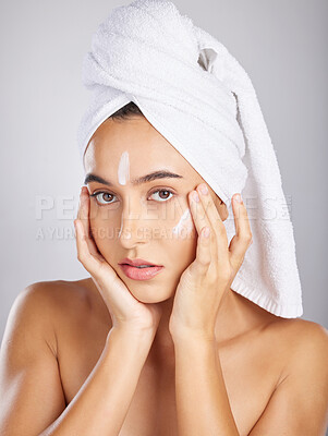 Buy stock photo Skincare, woman model and face portrait with facial moisturizer and spa cream in morning. Towel, sunscreen and skin wellness care of a young person with cosmetic, collagen and dermatology product