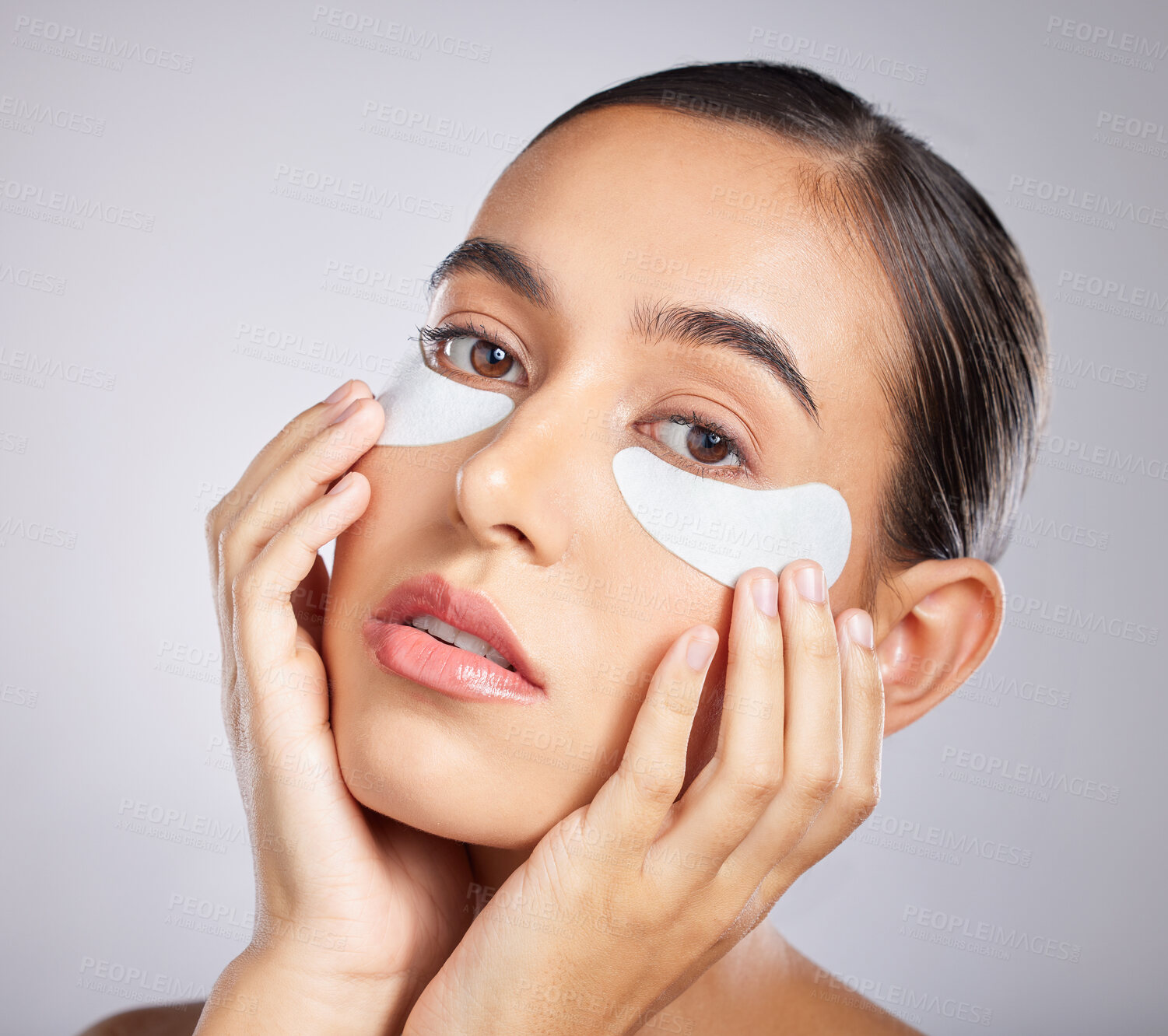 Buy stock photo Beauty, eye patch and face of woman with skincare product for self care, anti aging or facial wellness. Healthcare, spa salon and portrait of aesthetic girl with makeup cosmetics on studio background