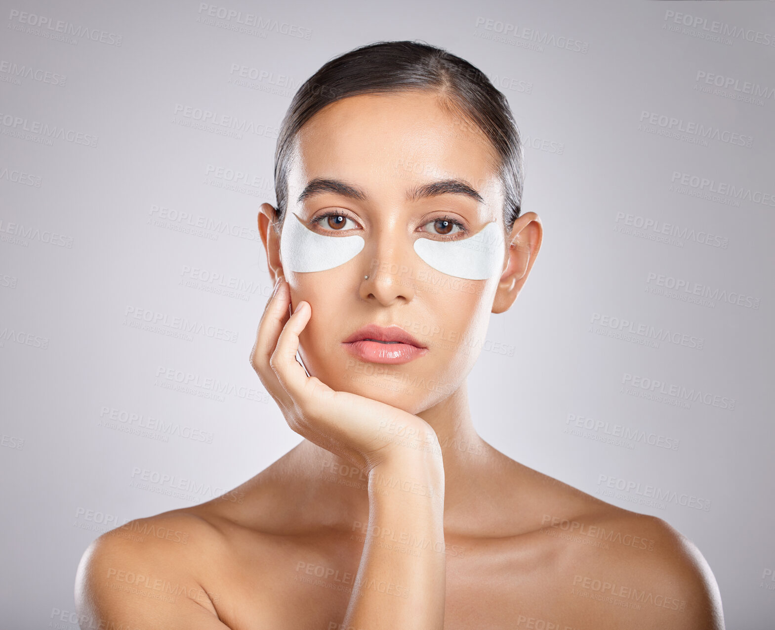 Buy stock photo Beauty, eye patch and portrait of woman with skincare product for self care, anti aging and wellness. Facial healthcare, spa salon and aesthetic model face with makeup cosmetics on studio background