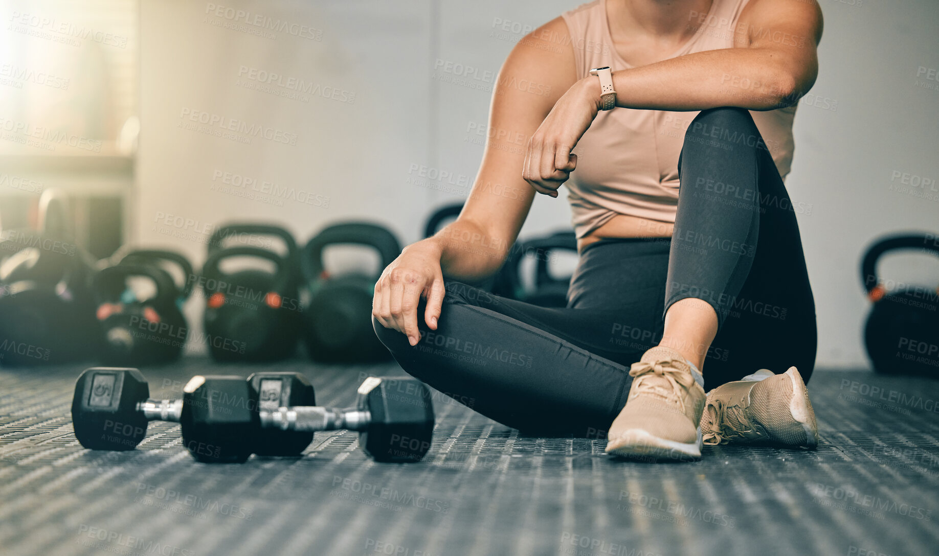Buy stock photo Dumbbells, gym and woman on a health studio club floor ready for training and exercise. Strength challenge, healthy athlete and power workout of an athlete on the ground rest after lifting weights